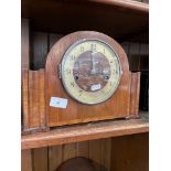 A walnut West Minster chime mantle clock.