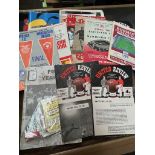 A bag of Manchester United programes and cup final tickets, including the first programme after