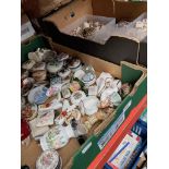 A box of shells and a box of ceramic trinket boxes, etc.