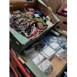 A box of costume jewellery and a box of jewellery making items, beads, etc.