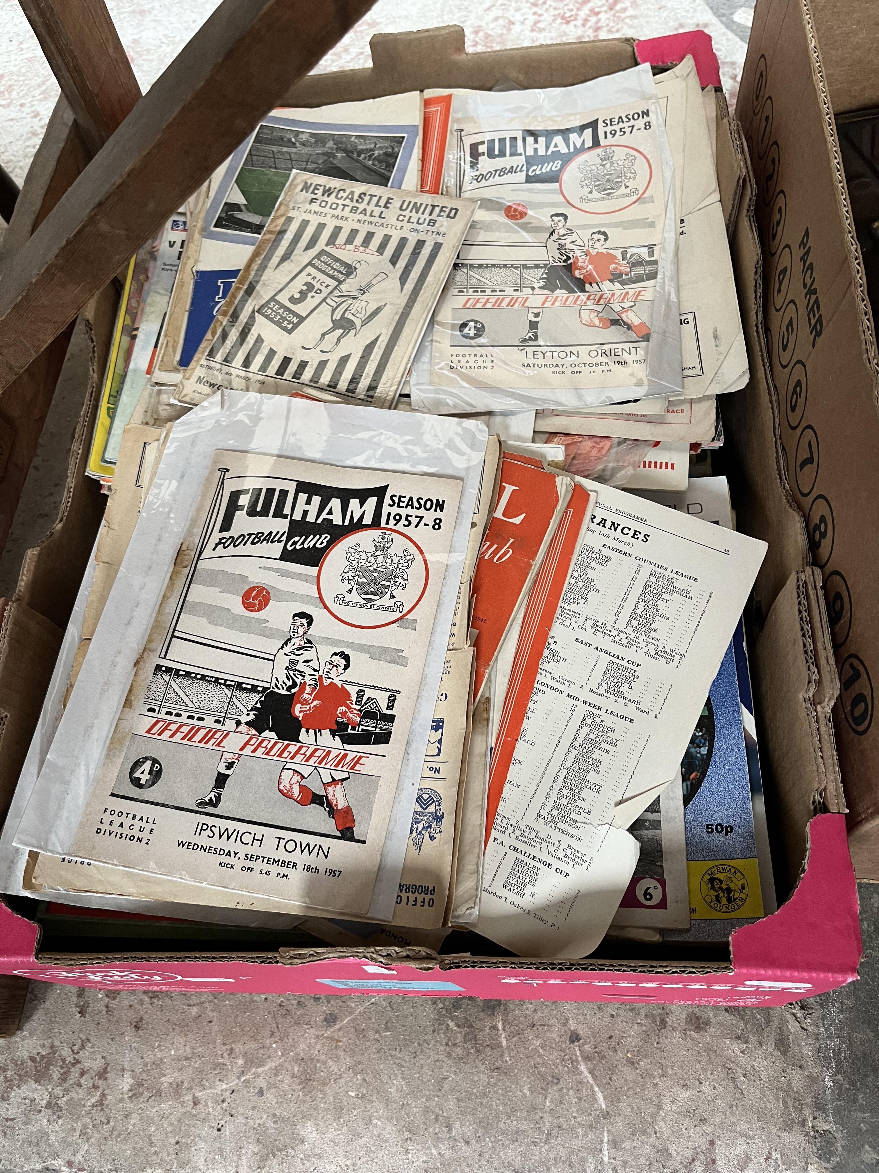 A box of approx 450 football programmes from the 1940s to 1990s, covering all divisions and cups and