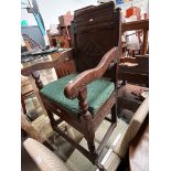 An 18th century carved oak Wainscot chair, some later elements.