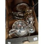 A box of silver plate and two clocks.