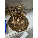 A brass tray together with brass candle sticks, brass and copper urns, brass fire front