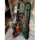 A Chinese violin in case with 2 bows