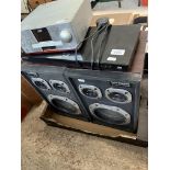 A pair of Goodmans speakers together with a Samsung DVD player and a JVC DVD player.