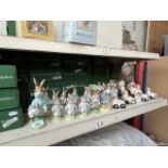 A large collection of Peter Rabbit and 8 clown figures by Beswick, with boxes - approx 30 pieces -