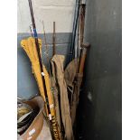 Assorted fishing rods including split cane, wood, Milbro etc.