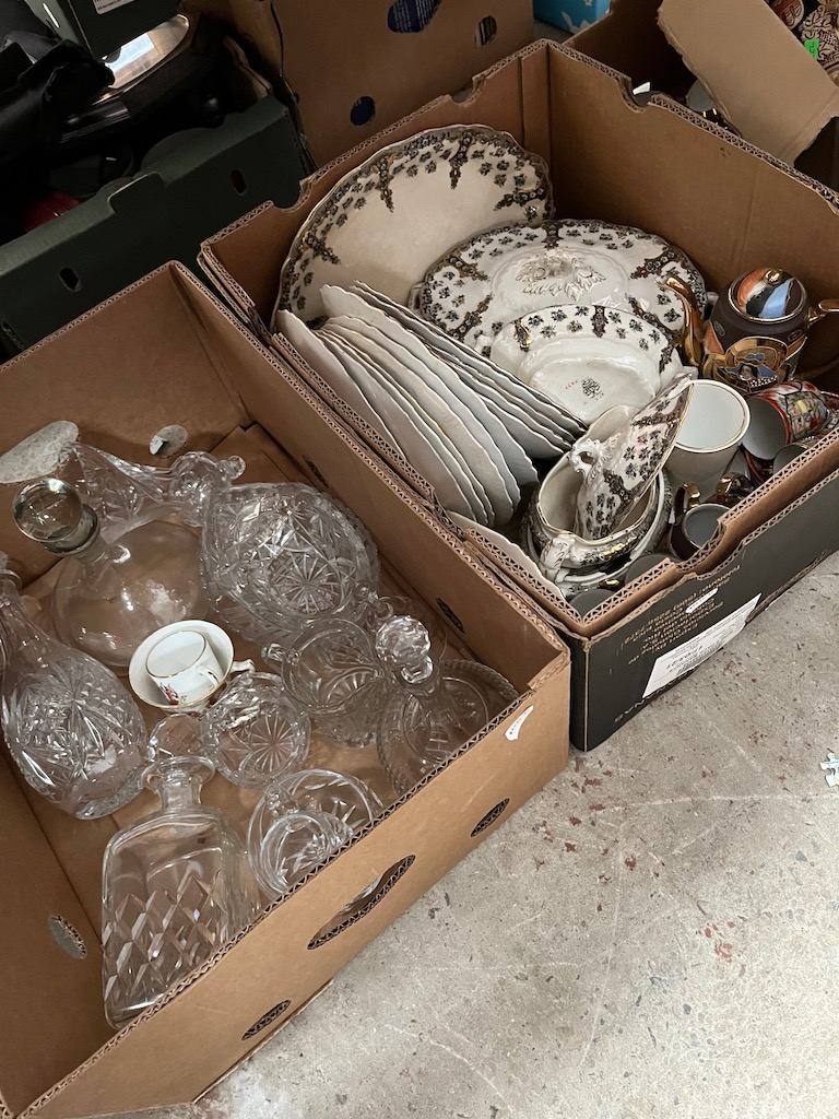 Two boxes of assorted pottery and glass including commemorative china, part dinner service etc.