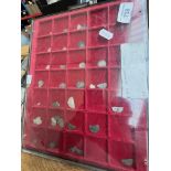 A tray of assorted hammered silver coins, not full shaped.