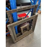 Two old gilt picture frames together with three others.