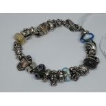 Trollbeads silver charm bracelet, gross wt, 89g, length 21cm.