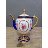 A House of Faberge Imperial Egg teapot, height 22.5cm.