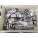 A box of watches including digital watches etc.