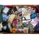 A box of assorted costume jewellery.