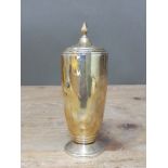 A George VI Art Deco style silver sugar shaker, Sanders & Mackenzie, Birmingham 1946, height 13cm,