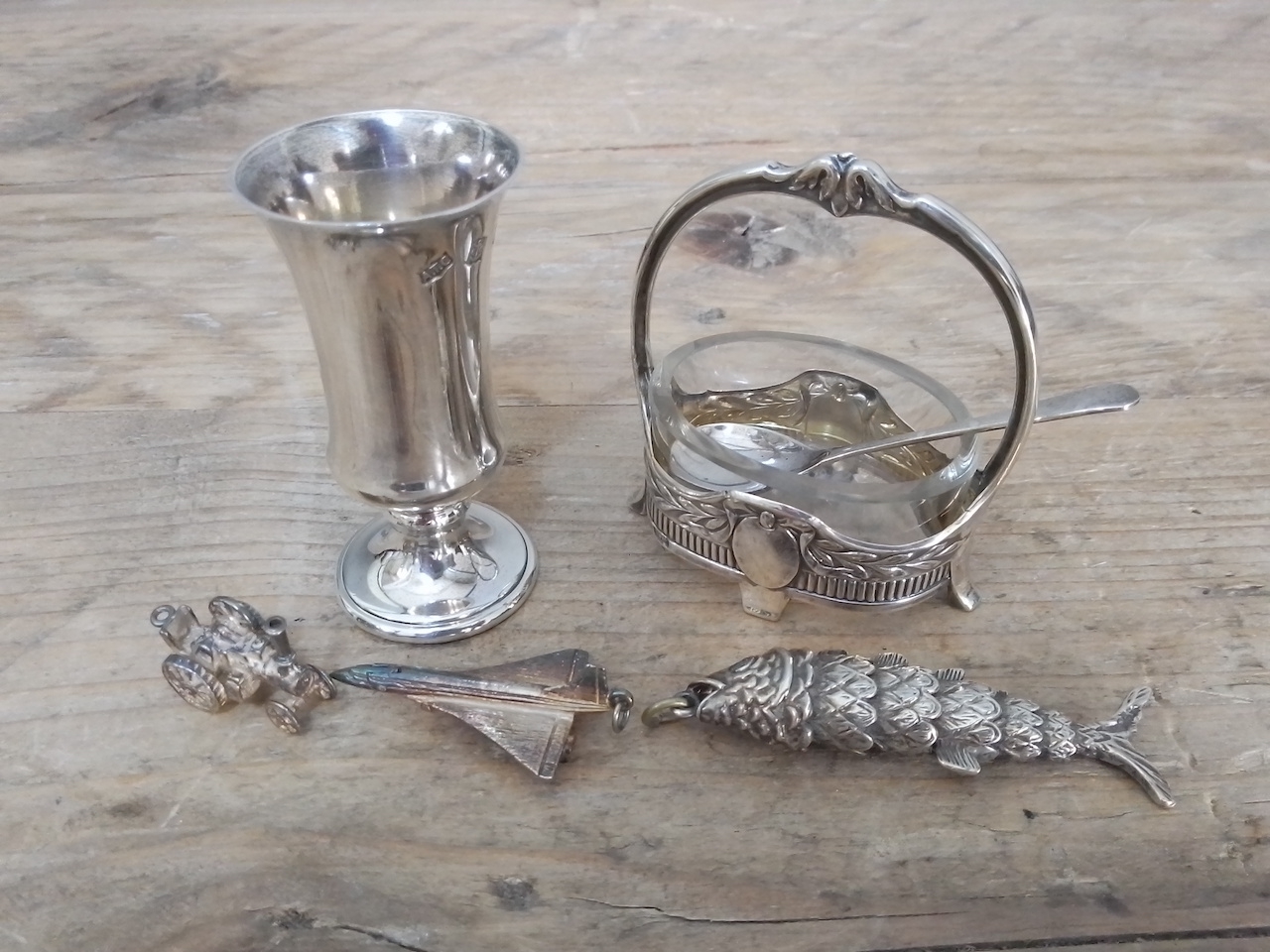 A mixed lot of silver and white metal comprising a German Secessionist style salt with matched