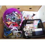 A box of assorted costume jewellery.