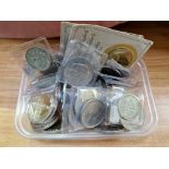 A tub of assorted GB coins to include silver half crowns & commemorative coins etc.
