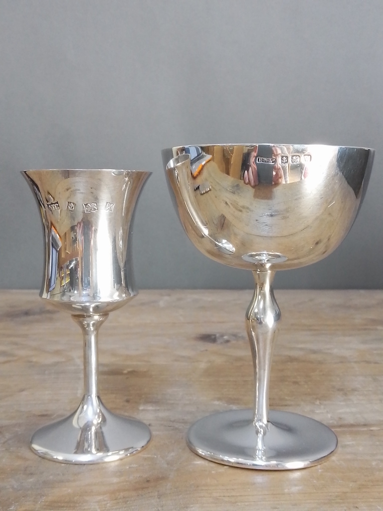 Two hallmarked silver pedestal goblets, height11cm & 12cm, wt. 6ozt.