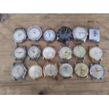 A group of 18 vintage wristwatches.