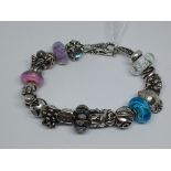 Trollbeads silver charm bracelet, gross wt. 64.3g, length 18cm.