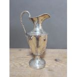 An Elizabeth II silver claret jug, Courtman Silver Ltd, London 1976, height 26cm, wt. 28ozt.