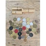 A tray of assorted tokens to include 3 packages of national transport tokens, Lucky seven bingo,