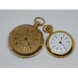 A silver gilt pocket watch and another.