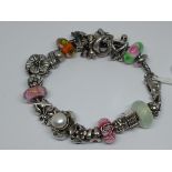 Trollbeads silver charm bracelet, gross wt. 75.2g, length 20cm.