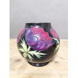 A Moorcroft pottery vase, height 16cm. Condition - good, minor wear including dirt, light marks