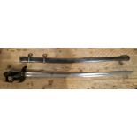 An Italian 1871 pattern heavy cavalry sword with regulation steel hilt, with metal scabbard,