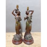 A pair of Art Nouveau patinated spelter lamp bases after Moreau, height 64cm.