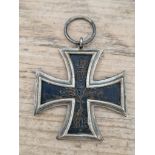 A German WWI Iron Cross 2nd class. No ribbon or legible makers mark. We believe this to be genuine