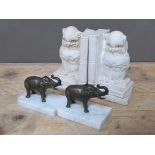 A pair of spelter elephants on marble bases and a pair of plaster owl bookends, length 13cm & 11cm