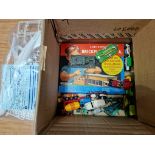 A box of assorted dicast toys and games to include Corgi, Dinky and MAtchbox etc..