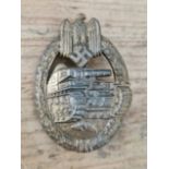 A German WWII Heer / Waffen-SS Panzer Assault badge, bronze grade, by Frank & Reif, Stuttgart.