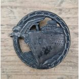 A German WWII Kriegsmarine Blockade Runners badge. No visible marks. We believe this to be genuine