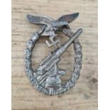 A German WWII Anti Aircraft Flak badge. In good condition overall, some marks, scratches,