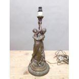 A late 19th century weight spelter lamp base, height 53cm.