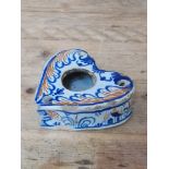 A Dutch delft 18th century heart shaped inkwell, length 13cm. Condition - various losses.