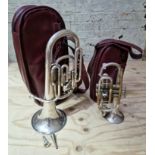 A Lark euphonium with mouthpiece and case together with a Chinese trumpet with case.