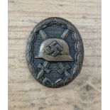 A German WWII Wound badge, hollow back. In good condition overall, pin and catch ok, pin a bit bent,