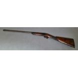 An antique percussion rifle with curved walnut butt, 101cm long, barrel sealed. Note:- no in-house