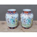 A pair of Japanese 19th century porcelain vase, decoration depicting figures, height 24cm. Condition