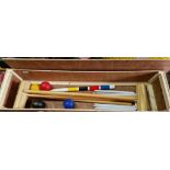 A vintage Jaques croquet set in associated wooden box.