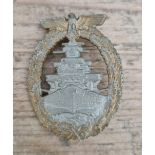 A German WWII Kriegsmarine High Seas fleet badge. Made of zinc, no visible marks. We believe this to