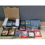 Acetronic MPU 1000 vintage games console together with 10 games and a PS1 console.