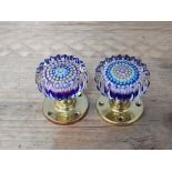 A pair of Perthshire millefiori glass paperweight door knobs.