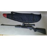 A SMK .22 calibre air rifle, with Air Arms 4 x 40 sight, 114cm long, with soft bag (rifle does not